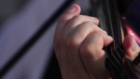 violin playing close-up