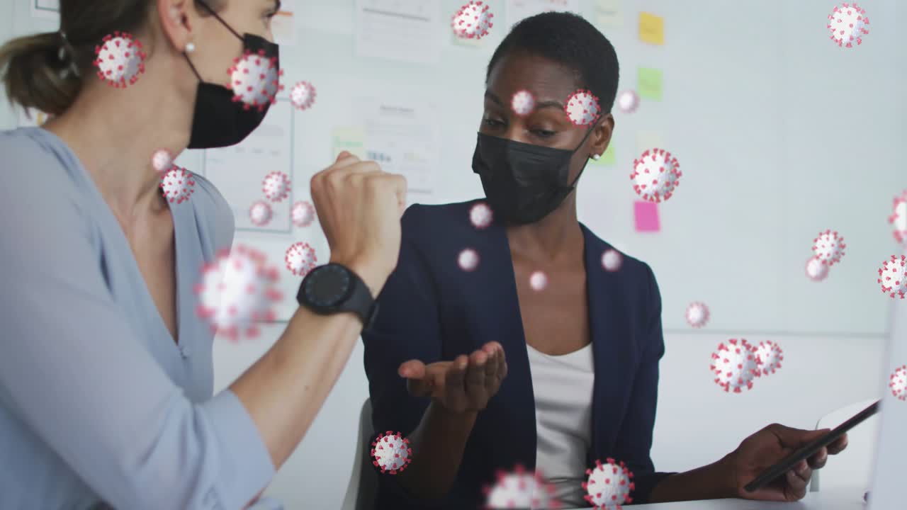 Phone ringing starting call, two women checking laptop, fist-bumping, virus overlays showing health