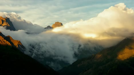 dramatic sunset over mountains with clouds