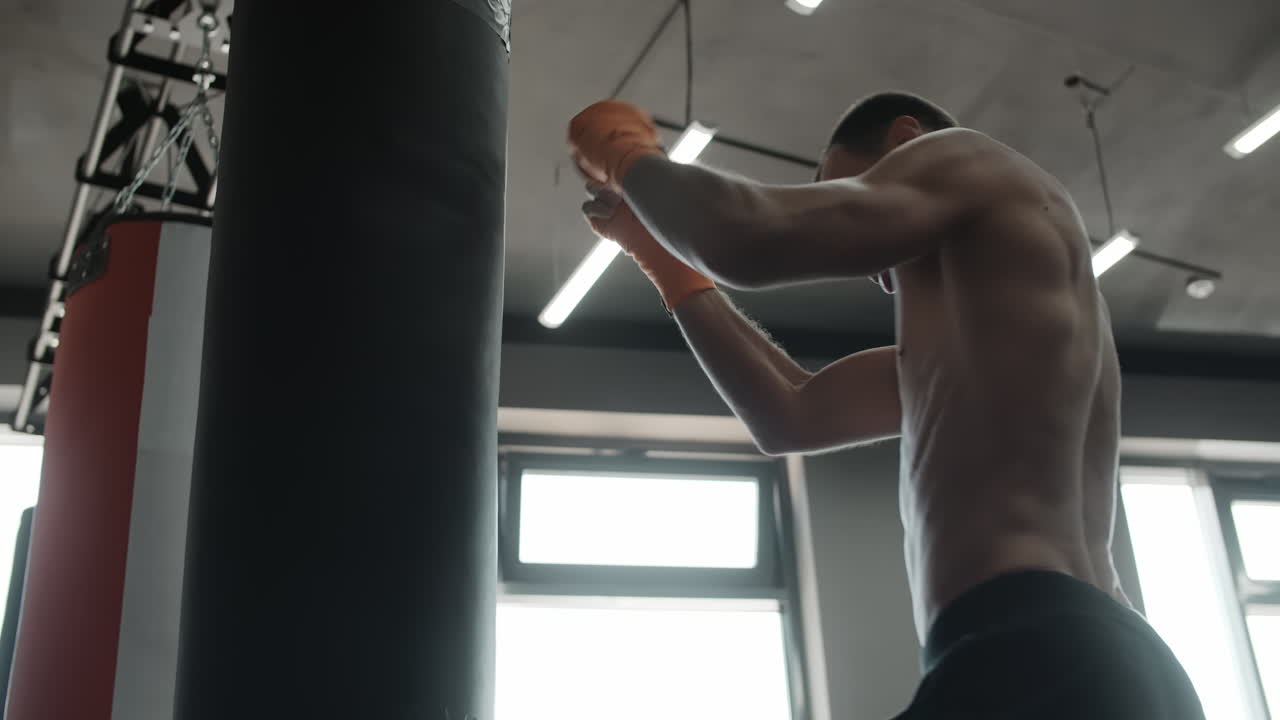 Man Boxing Training at Gym