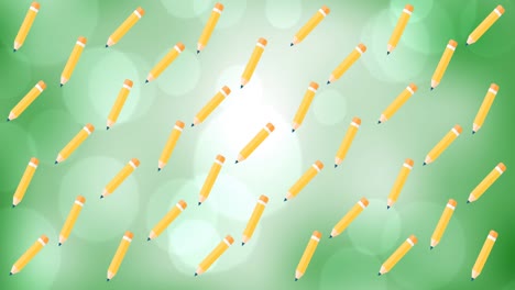 animación digital de varios iconos de lápices flotando contra puntos de luz sobre un fondo verde