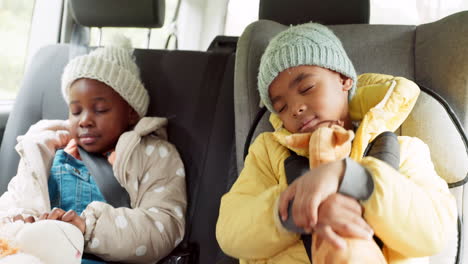 car. travel and children sleep in backseat on road