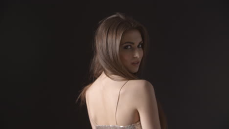 Close-up-shot-of-smiling-young-woman-in-evening-dress