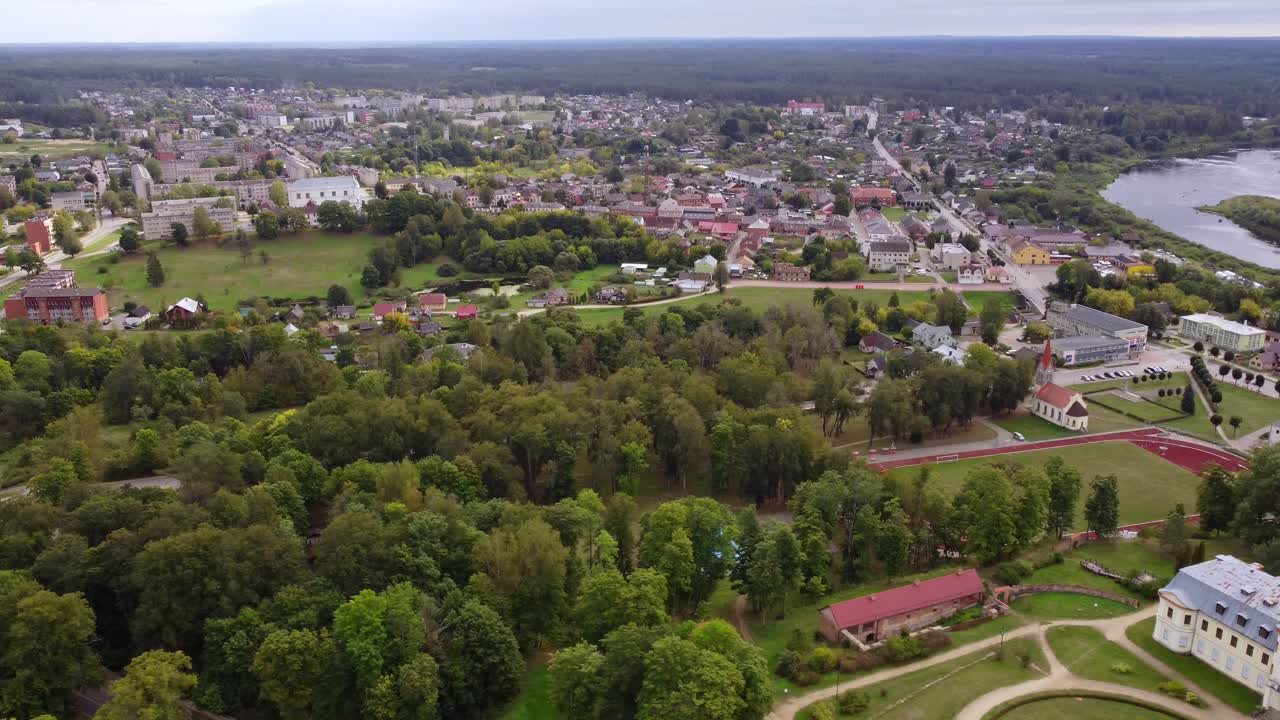 Kraslava township with historic manors on Daugava river bank, aerial view