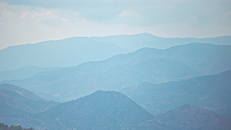 mount olympus on the island of cyprus under a gray cloud cover