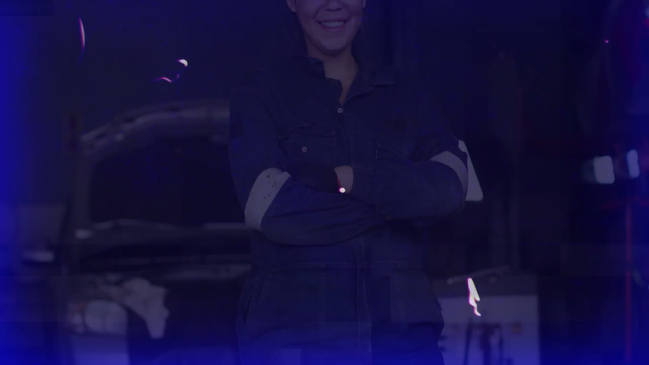 Woman mechanic standing arms crossed in automotive workshop, featuring animated engine data charts