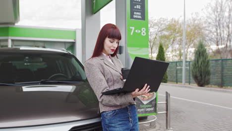 Businesswoman Working at Gas Station