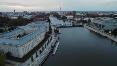 Aerial-shot-over-the-Oder-river-and-the-Peace-Bridge,-in-polish-Most-Pokoju