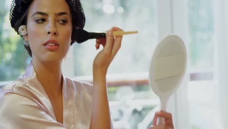 bridesmaid applying make-up and being offered a glass of champagne 4k 4k