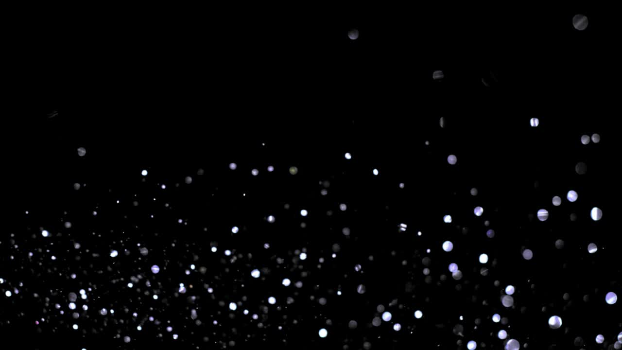 A glitter effect creates a sparkling, shimmering appearance with tiny, reflective particles that catch the light, adding a magical or festive touch to visuals.