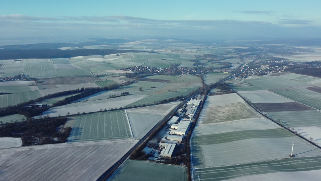 Winter Aerial View of a European Farmland and Industrial Area