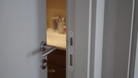 opened white door to a bathroom