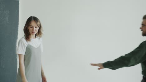 photographer and model entering photo studio and taking pictures