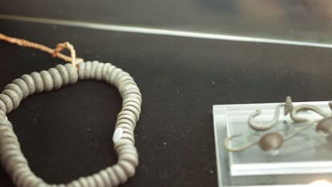 close up footage of ancient thai north- eastern style bracelets, necklace and earrings