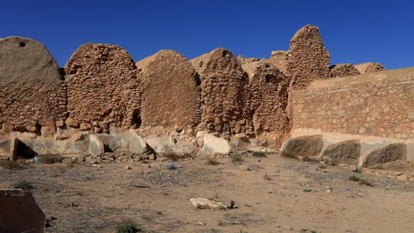 ancient ksar in tunisia with stone walls under a clear blue sky