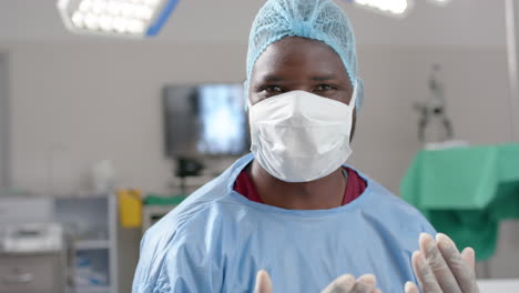 focused african american surgeon in an operating room