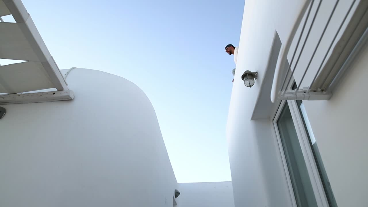 man jumping on the roof