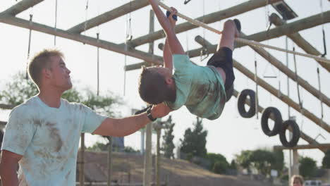 Caucasian-boy-training-at-boot-camp-