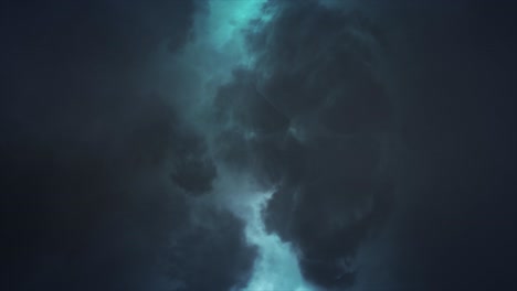 cloud lightning - eerie spectacular and dramatic lightening storm illuminating dark and sullen skull shaped cloud with brilliant and intense bolts and flashes of pale blue lightning