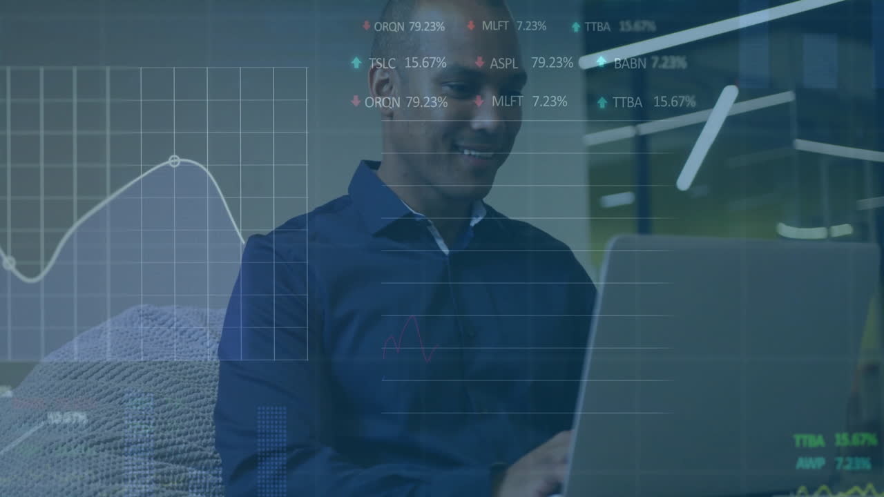 Animation of trading board and graphs over african american businessman using laptop in office