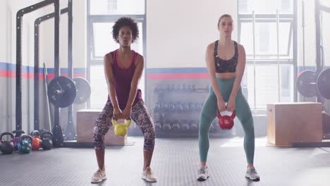 video montage of two diverse, determined women working out at a gym