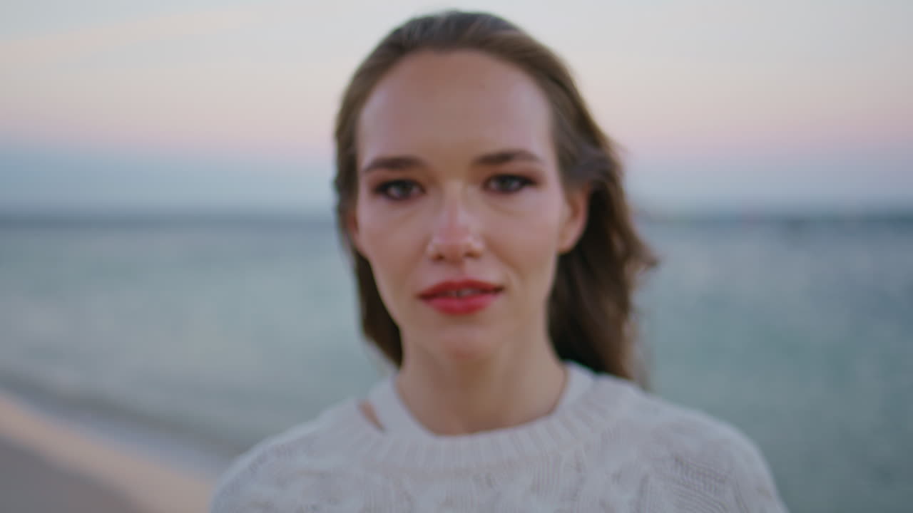 Portrait model evening beach. Woman standing coast at sunset marine skyline