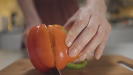 woman preparing vegetables in kitchen