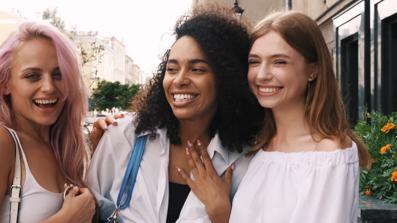 Three Friends Laughing on the Street