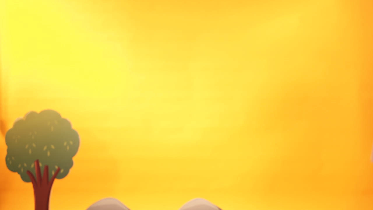 Funny children are playing with a big red car. Decorative background. Studio shooting of children