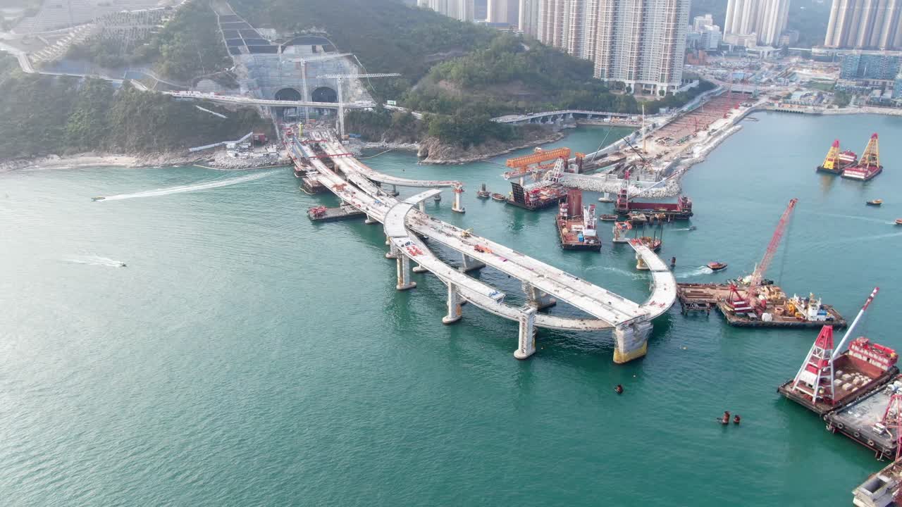 proyecto de construcción del enlace cruzado de la bahía de hong kong, un puente doble de dos carriles que conecta el túnel tseung kwan o lam tin con la carretera wan po, vista aérea