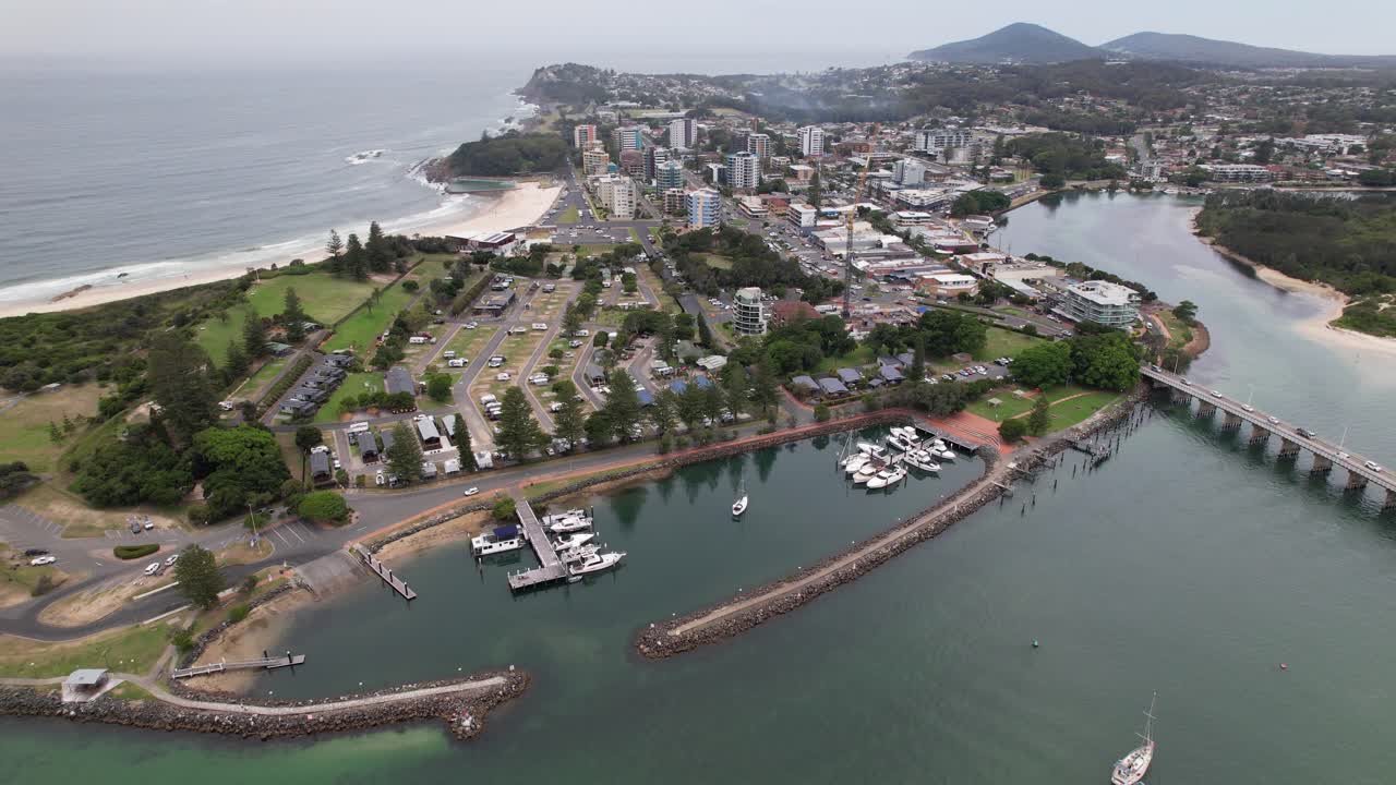Forster Harbor And Townscape On The Banks Of Coolongolook River In New South Wales, Australia. aerial pullback shot