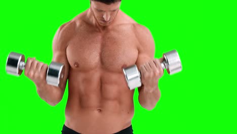 Serious-muscular-man-lifting-dumbbells-