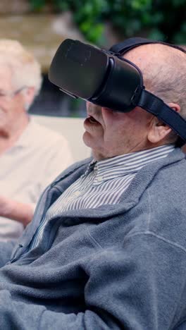 elderly man experiencing virtual reality with a vr headset