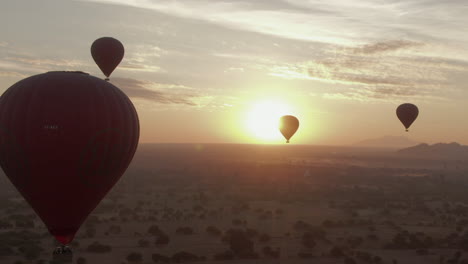 close up of hot air balloon during a beautiful cinematic sunrise over bagan, myanmar