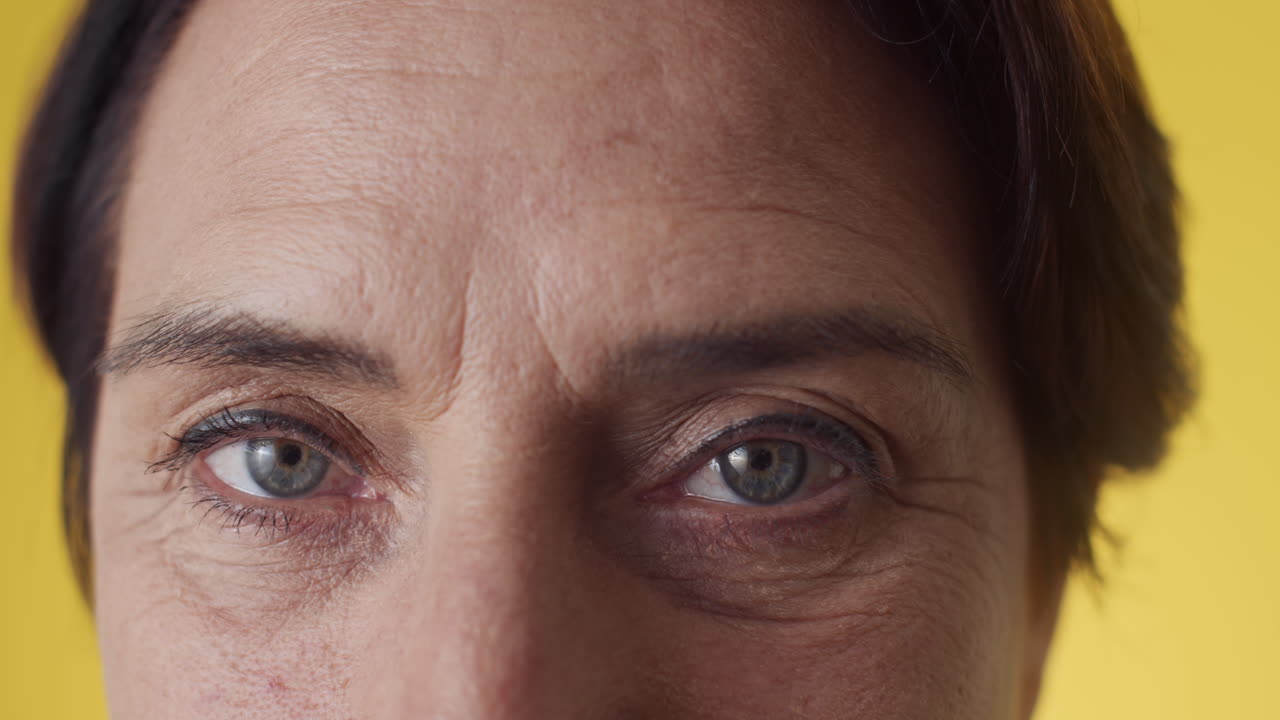 Blue Eyes of Mature Woman with Aging Changes
