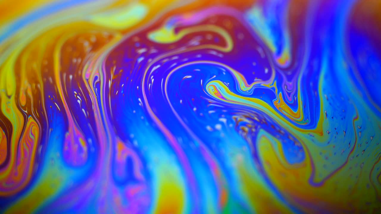 Colori in movimento, effetto liquido, bolle di sapone.