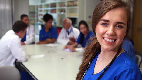 Medical-student-smiling-at-the-camera-during-class