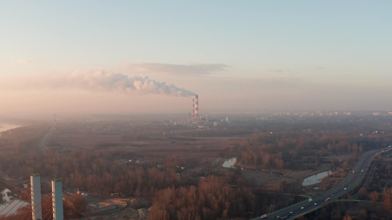 Drone footage of heat and power plant in Warsaw, Poland. EC Siekierki seen autumn during sunrise