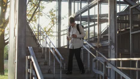 young man walking upstairs