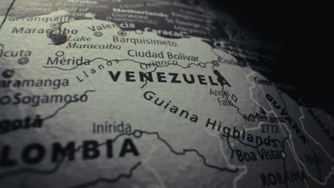 close-up of a vintage world map, focusing on venezuela and colombia