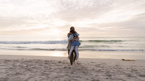 Grandmother,-child-and-family-hug-at-beach-for-fun