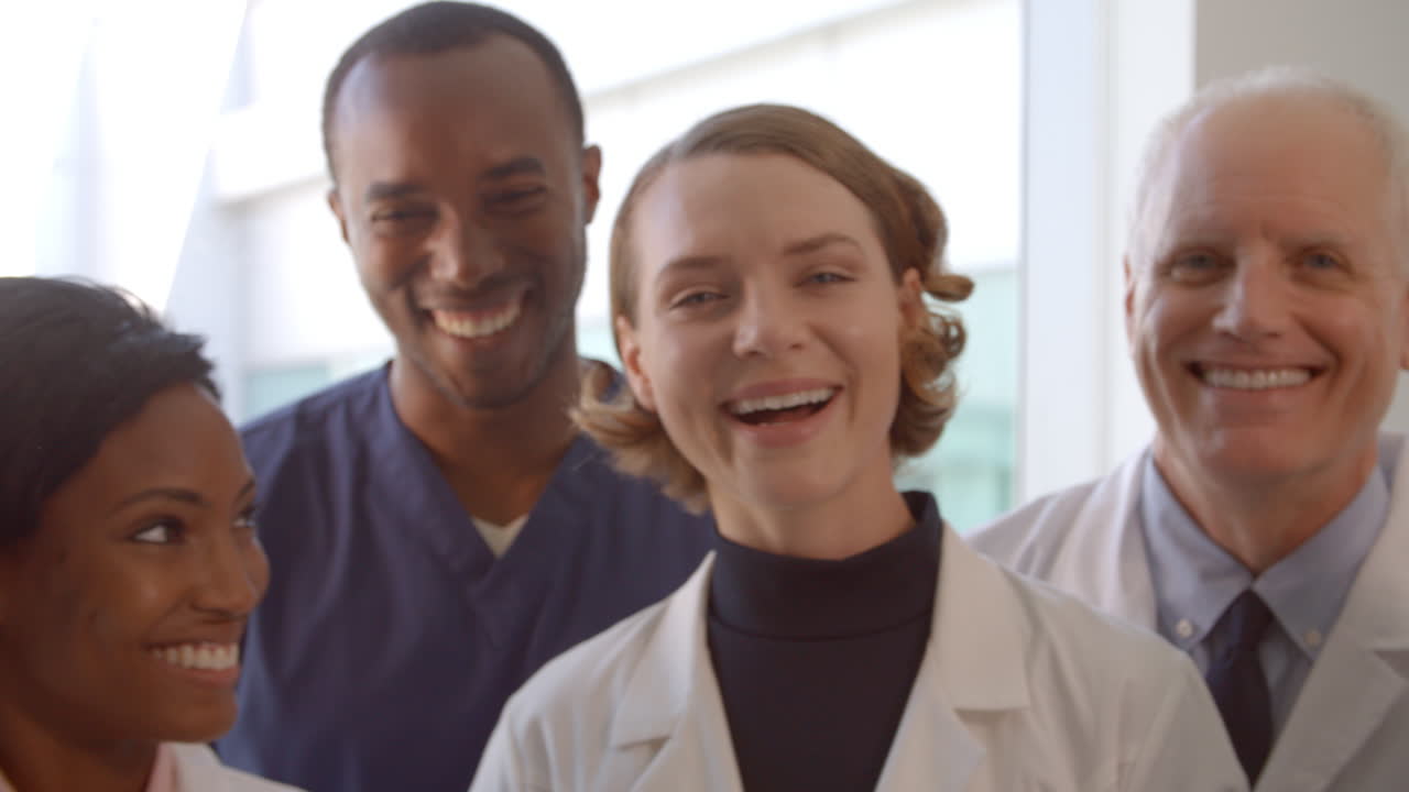 Portrait Of Medical Staff In Hospital Exam Room