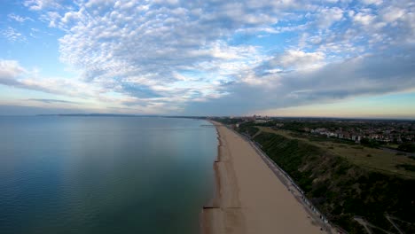 Aerial-Drone-Footage-along-Boscombe-Beach,-Bournemouth,-Dorset