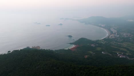 drone : high altitude drone shot of the coast line of ixtapa after sunset