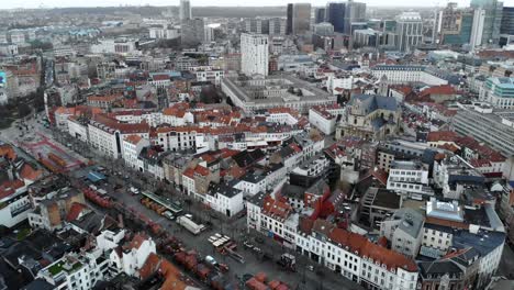 aerial flight over brussels city's buildings and streets, belgium