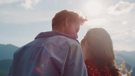 Cheerful-family-relax-nature-mountains-on-holiday.-Closeup-couple-enjoy-view.