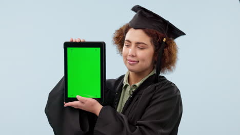 Tablet,-green-screen-and-a-woman-student