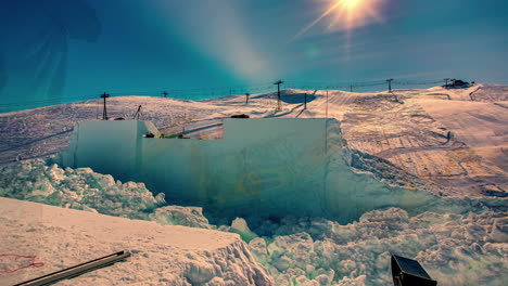 construcción de una gruesa pared blanca hecha de nieve condensada utilizando equipos mecánicos, lapso de tiempo