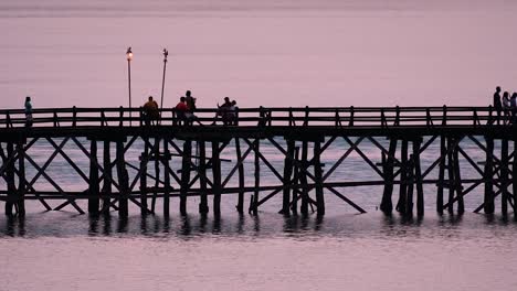 The-Mon-Bridge-is-an-old-wooden-bridge-located-in-Sangkla,-Thailand