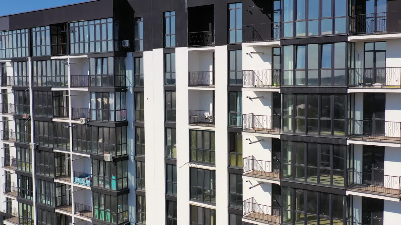 Aerial view of modern residential complex. Building exterior aerial view of new house in city